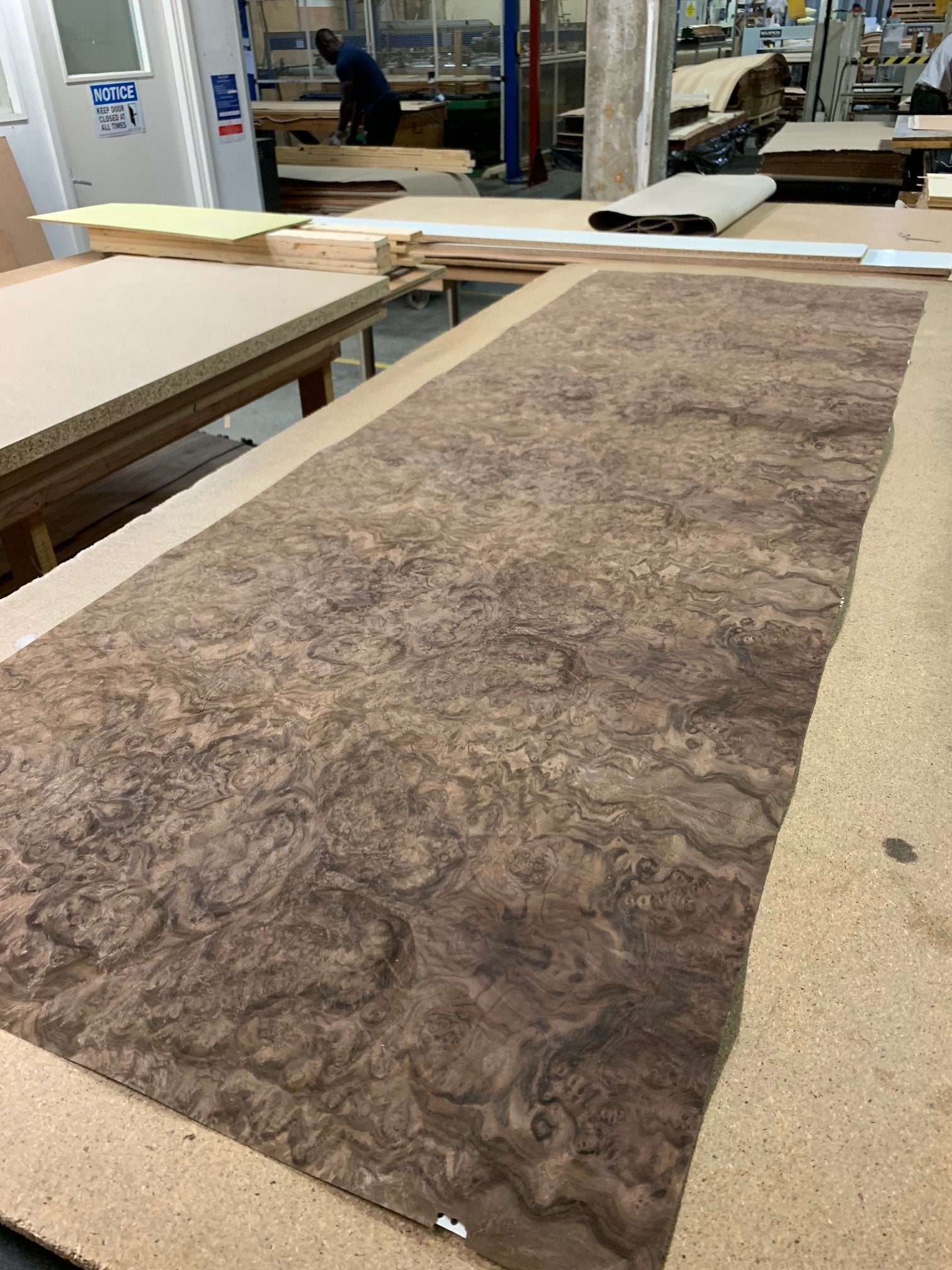What is Walnut Burl veneer and how is it produced?